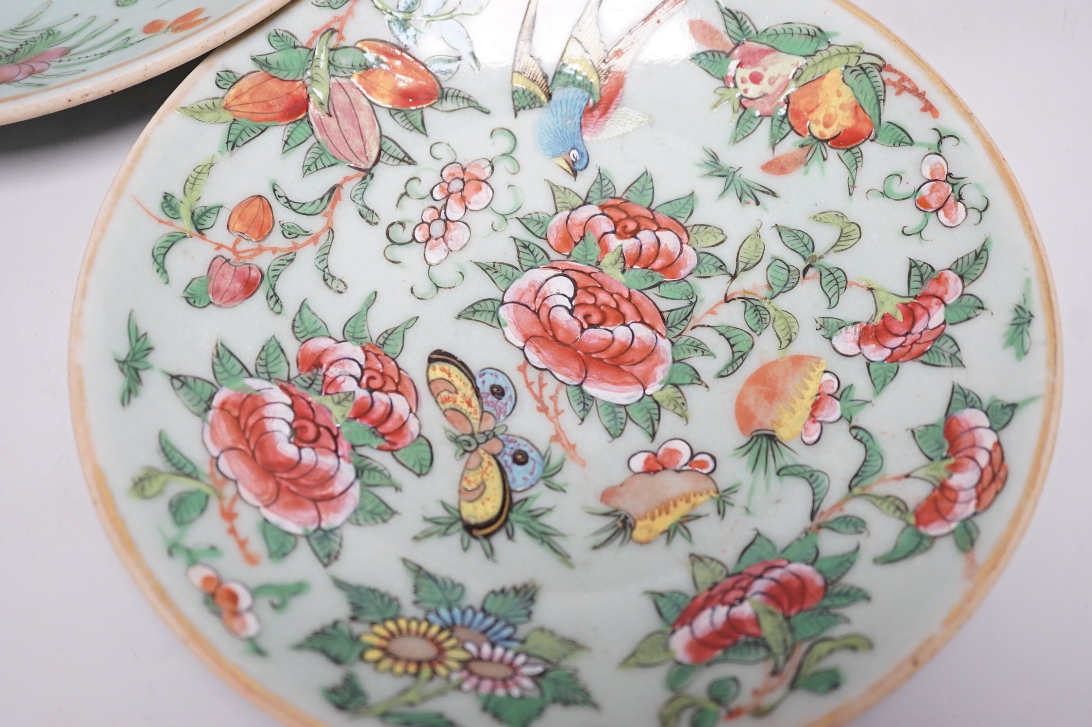 Five 19th century Chinese celadon glazed famille rose dishes, largest 23.5 cm